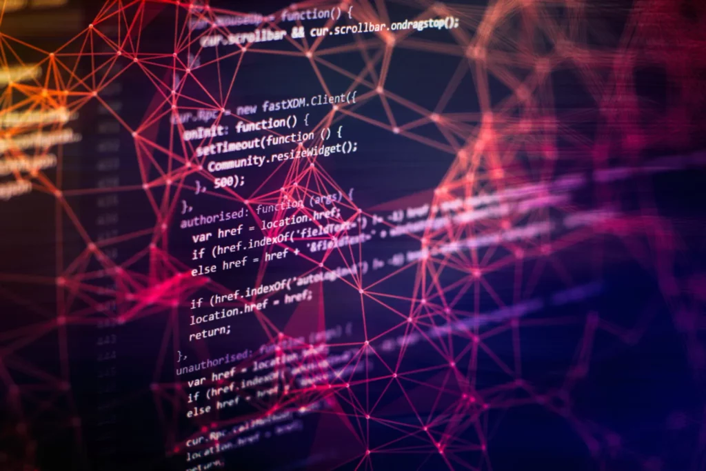 Un écran d'ordinateur affiche des lignes de code en texte blanc sur un fond sombre, superposées à un réseau de lignes rose et orange lumineuses formant un motif en forme de toile, créant ainsi une impression de numérique et de technologie.