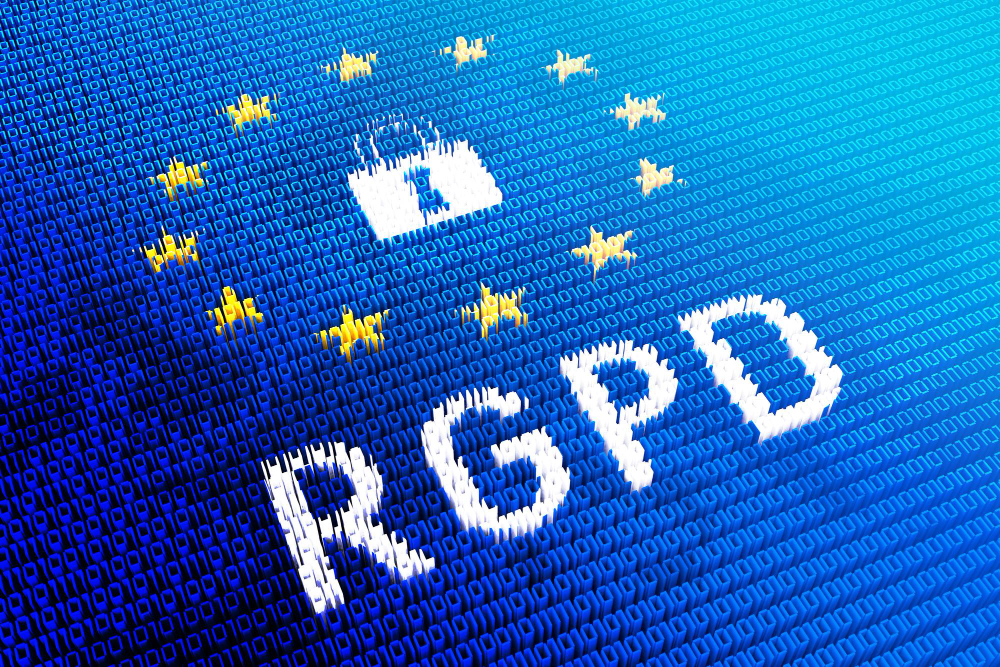 EU flag motif with a white padlock icon and the word FREEDOM in bold letters over a binary-pattern background, suggesting digital privacy in Europe.